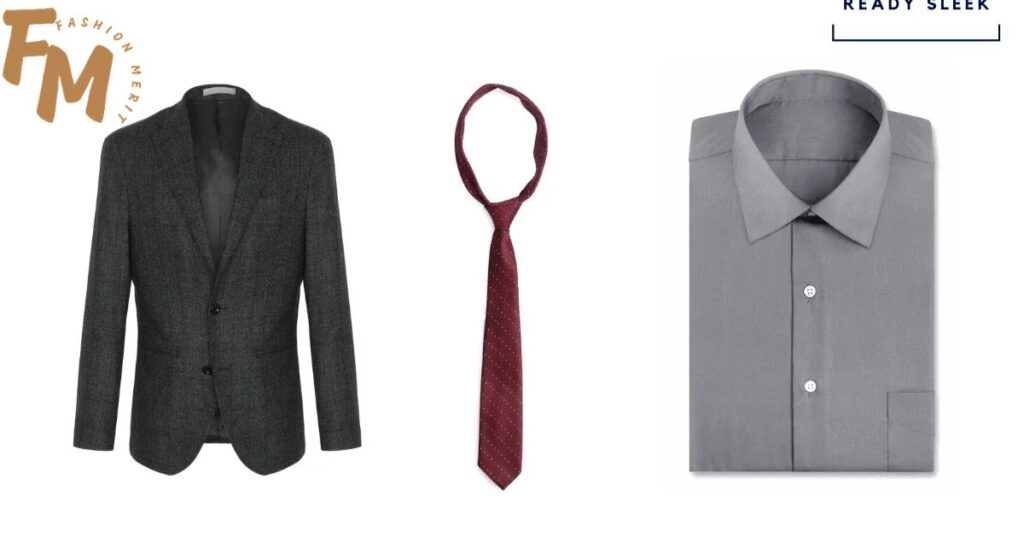 Fashionable man styling a black suit with a grey shirt and pocket square.
