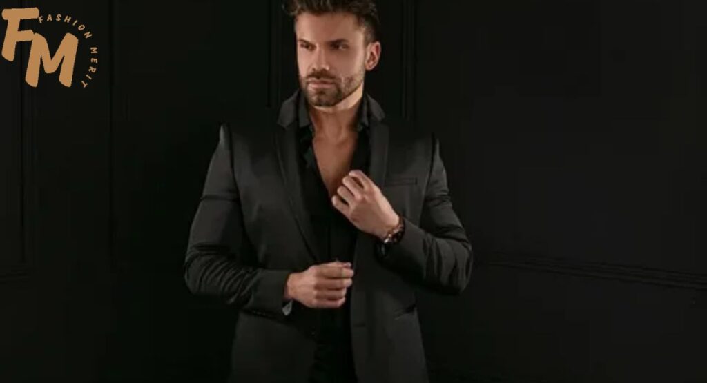 Black suit paired with a charcoal grey shirt for a formal evening look.