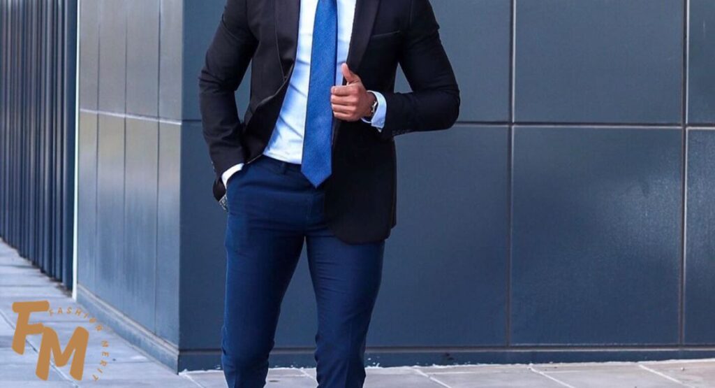 Black suit with light blue shirt, blue striped tie, and pocket square for men